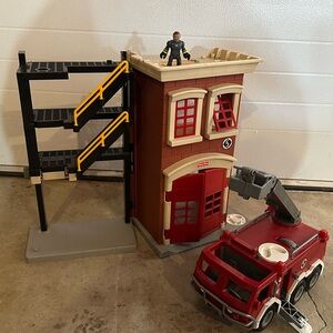 Fisher Price Fire Station Playset with a Fire Truck and 1 fireman